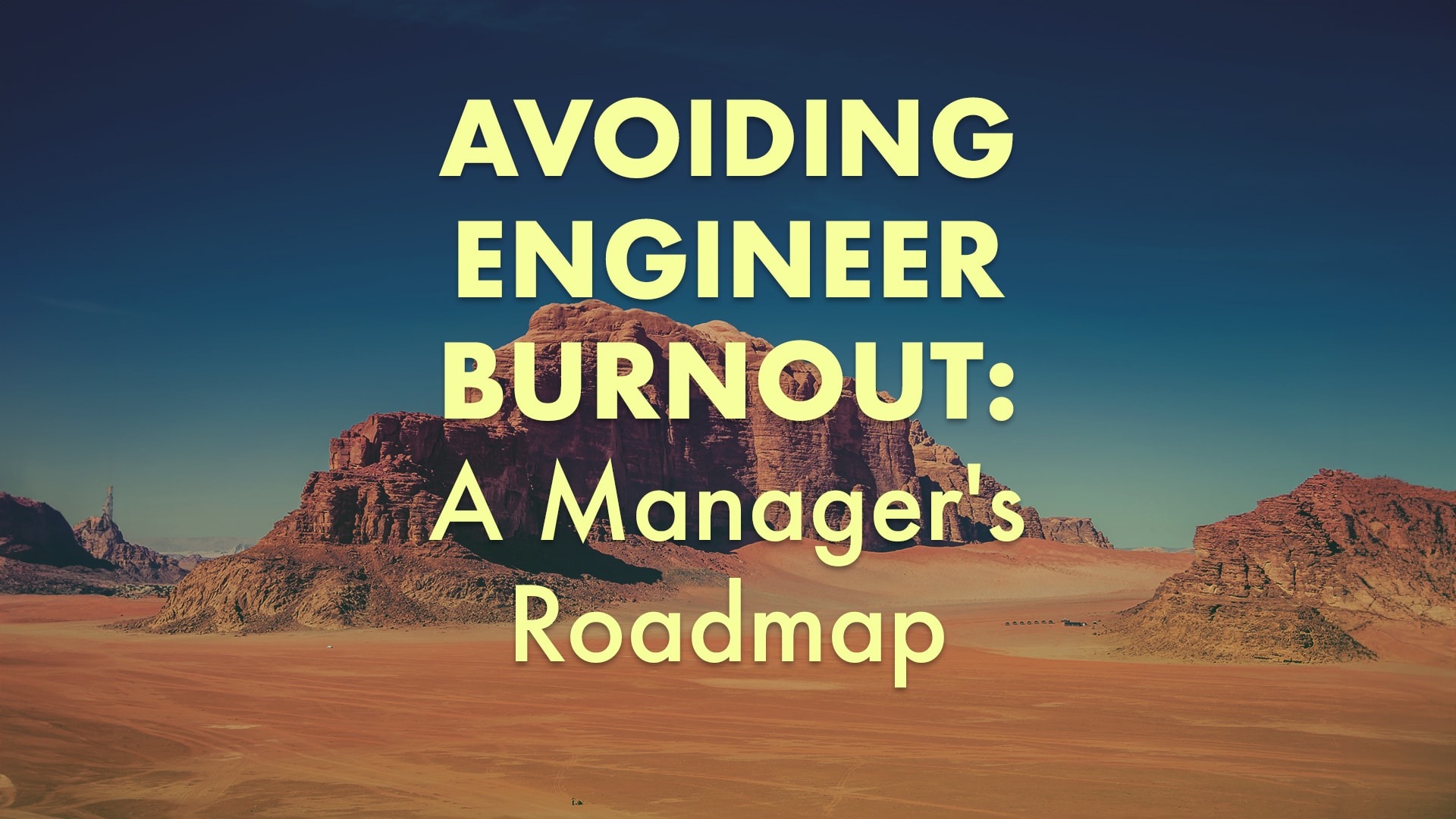 Desert landscape with the text, 'Avoiding Engineer Burnout: A Manager's Roadmap', over it.